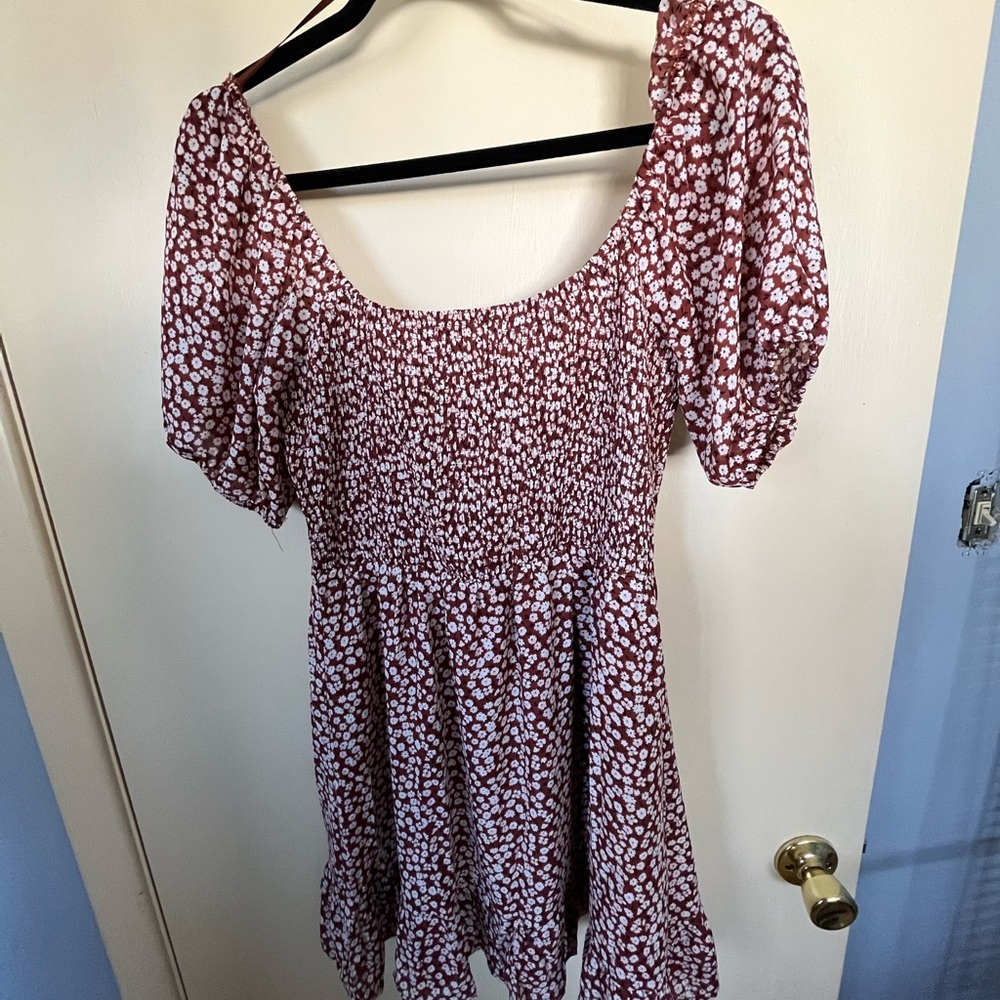 Lelia dress from Too Blue boutique. Size medium. Reddish orange floral